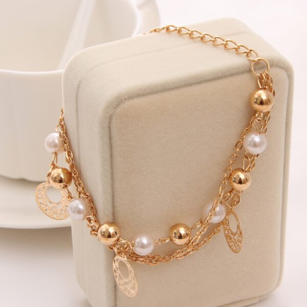 Gold Multi-Layer Bracelets - Image 8